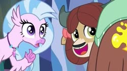 Size: 563x317 | Tagged: safe, screencap, silverstream, yona, classical hippogriff, hippogriff, yak, g4, season 9, uprooted, accident, bow, cute, embarrassed, female, hair bow, horns, hulu thumbnail, jewelry, mistake, monkey swings, necklace, oops, open mouth, out of context, paint, pearl necklace, singing, smiling, talons, teenager, the place where we belong, yonadorable