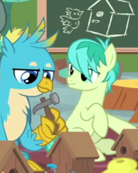 Size: 225x283 | Tagged: safe, screencap, gallus, sandbar, bird, earth pony, griffon, pony, g4, interseason shorts, teacher of the month (episode), beehive, bird house, chalkboard, cropped, duo, duo focus, hammer, looking at someone, raised hoof, sitting