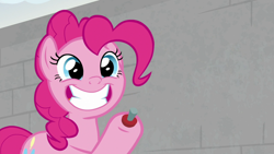 Size: 1920x1080 | Tagged: safe, screencap, pinkie pie, earth pony, pony, g4, the last laugh, female, holding, joy buzzer, mare, raised hoof, smiling, solo