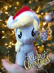 Size: 1000x1352 | Tagged: safe, artist:meplushyou, derpy hooves, pegasus, pony, g4, background pony, christmas, christmas tree, hand, holding a pony, holiday, irl, photo, plushie, tree