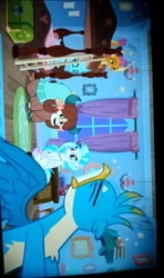 Size: 720x1219 | Tagged: safe, screencap, gallus, ocellus, silverstream, smolder, yona, changedling, changeling, classical hippogriff, dragon, griffon, hippogriff, yak, g4, school raze, bedroom, bow, bunk bed, closed mouth, cloven hooves, colored hooves, dormitory, dragoness, eyes closed, female, grinding, gritted teeth, hair bow, jewelry, looking at someone, looking back, male, monkey swings, necklace, open beak, picture of a screen, pulling, shocked, shocked expression, sideways image, sitting, sitting on bed, sitting on floor, smolder is not amused, spread wings, struggling, teeth, unamused, video at source, wings
