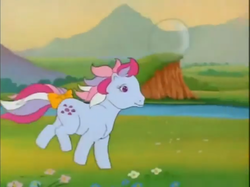 Size: 771x577 | Tagged: safe, screencap, sweet stuff, g1, my little pony 'n friends, the magic coins, bow, bubble, cute, meadow, river, sweet sweet stuff, tail bow