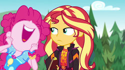 Size: 1920x1080 | Tagged: safe, screencap, pinkie pie, sunset shimmer, equestria girls, equestria girls specials, g4, my little pony equestria girls: better together, my little pony equestria girls: sunset's backstage pass, clothes, duo, duo female, excited, female, geode of empathy, geode of sugar bombs, happy, jacket, magical geodes, music festival outfit, nose in the air, open mouth, outdoors, ponk, sunset's journal