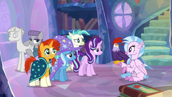 Size: 1920x1080 | Tagged: safe, screencap, edith, maud pie, mudbriar, silverstream, starlight glimmer, sunburst, terramar, trixie, classical hippogriff, cockatrice, earth pony, hippogriff, pony, unicorn, g4, student counsel, book, cape, clothes, female, hat, male, mare, petrification, stallion, statue, treehouse of harmony, wizard hat
