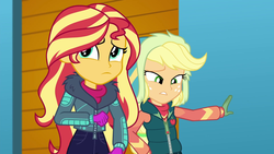 Size: 1920x1080 | Tagged: safe, screencap, applejack, sunset shimmer, equestria girls, equestria girls specials, g4, my little pony equestria girls: better together, my little pony equestria girls: holidays unwrapped, winter break-in, clothes, duo, duo female, female, gloves, jacket, self-storage facility, sweater, turtleneck, vest, winter jacket, winter outfit