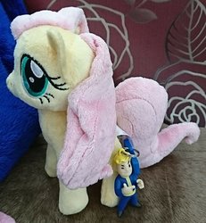 Size: 1080x1171 | Tagged: safe, artist:omegapony16, fluttershy, pegasus, pony, g4, fallout, female, irl, keychain, mare, one eye closed, photo, plushie, vault boy, wink