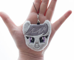 Size: 1000x802 | Tagged: safe, artist:meplushyou, octavia melody, earth pony, human, pony, g4, charm, female, hand, irl, irl human, looking at you, mare, photo, plushie, smiling