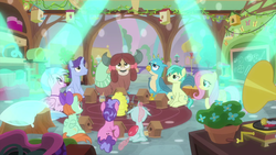 Size: 1280x720 | Tagged: safe, screencap, fluttershy, gallus, november rain, ocellus, sandbar, silverstream, yona, changedling, changeling, classical hippogriff, earth pony, griffon, hippogriff, pegasus, pony, unicorn, yak, g4, interseason shorts, teacher of the month (episode), bird house, bow, classroom, colored hooves, female, friendship student, hair bow, jewelry, male, mare, monkey swings, necklace, stallion, teenager