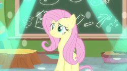 Size: 450x252 | Tagged: safe, screencap, fluttershy, pegasus, pony, g4, interseason shorts, teacher of the month (episode), chalkboard, female, gif, grin, mare, nervous, nervous smile, non-animated gif, smiling, solo