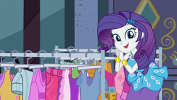 Size: 1920x1080 | Tagged: safe, screencap, rarity, equestria girls, g4, my little pony equestria girls: better together, street chic, beautiful, belt, bracelet, clothes, clothes rack, cute, cutie mark on clothes, dress, eyeshadow, female, frilly design, geode of shielding, gold, hairpin, hands together, jewelry, magical geodes, makeup, open mouth, open smile, pencil skirt, pendant, raribetes, skirt, sleeveless, smiling, solo, talking to viewer, tank top