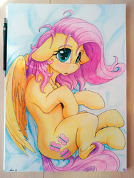Size: 3456x4608 | Tagged: safe, artist:alcor, fluttershy, pegasus, pony, g4, :o, alcor is trying to murder us, blushing, cheek fluff, chest fluff, cute, daaaaaaaaaaaw, eyelashes, female, floppy ears, fluffy, high res, hnnng, hoof fluff, leg fluff, looking at you, lying down, mare, messy mane, neck fluff, on side, open mouth, shoulder fluff, shyabetes, signature, solo, stray strand, traditional art, wing fluff, wings