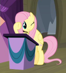 Size: 803x892 | Tagged: safe, screencap, fluttershy, pegasus, pony, g4, horse play, bipedal, cropped, cute, female, lectern, mare, one eye closed, podium, raised hoof, shyabetes, smiling, wink