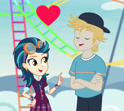 Size: 636x569 | Tagged: safe, screencap, gold rush (g4), indigo zap, equestria girls, equestria girls series, g4, rollercoaster of friendship, background human, crack shipping, cropped, female, heart, male, roller coaster, ship:goldzap, shipping, straight