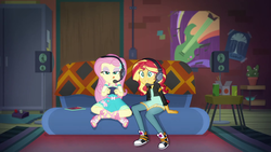 Size: 1920x1080 | Tagged: safe, screencap, fluttershy, sunset shimmer, equestria girls, g4, game stream, my little pony equestria girls: better together, converse, female, gamer sunset, gamershy, headphones, headset, shoes, sneakers, sunset's apartment, tongue out