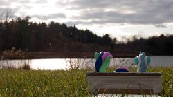 Size: 1024x576 | Tagged: safe, artist:dustysculptures, bon bon, lyra heartstrings, sweetie drops, earth pony, pony, unicorn, g4, bench, craft, duo, grass, irl, photo, sculpture, water