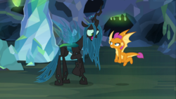 Size: 1667x937 | Tagged: safe, screencap, ocellus, queen chrysalis, smolder, changedling, changeling, changeling queen, g4, what lies beneath, disguise, disguised changeling, duo, female, flying, laughing, open mouth, queen chrysellus, raised hoof, smolder is not amused