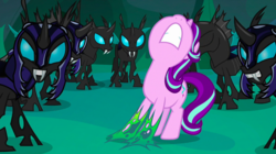 Size: 1440x808 | Tagged: safe, screencap, starlight glimmer, thorax, changeling, pony, unicorn, g4, to where and back again, armor, changeling armor, changeling guard, changeling slime, disguise, disguised changeling, fake starlight glimmer, female, mare, nose in the air, straining, stuck
