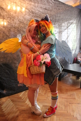 Size: 3456x5184 | Tagged: safe, fluttershy, rainbow dash, human, g4, clothes, convention, converse, cosplay, costume, cyrillic, hug, irl, irl human, photo, russian, shoes
