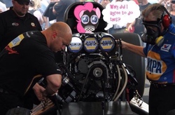 Size: 1440x942 | Tagged: safe, pinkie pie, earth pony, pony, g4, car, dragster, funny car, gas mask, irl, mask, napa, nhra, nitromethane, photo, ponies in real life, racecar, thought bubble, worried
