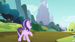 Size: 1280x720 | Tagged: safe, screencap, starlight glimmer, pony, unicorn, g4, no second prances, cloud, confused, female, flower, forest, frown, hill, looking up, mare, mountain, path, raised hoof, scenery, sky, solo, tree