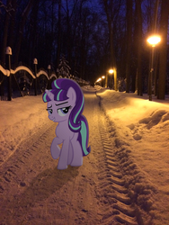 Size: 2448x3264 | Tagged: safe, artist:albertuha, starlight glimmer, pony, unicorn, g4, female, frown, high res, irl, mare, night, photo, ponies in real life, raised hoof, smiling, snow, solo, winter