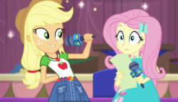 Size: 1280x738 | Tagged: safe, screencap, applejack, fluttershy, best in show: the pre-show, equestria girls, g4, my little pony equestria girls: better together, cute, female, jackabetes, microphone, nervous, shy, shyabetes, smiling