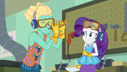 Size: 1920x1080 | Tagged: safe, screencap, rarity, zephyr breeze, equestria girls, equestria girls series, g4, schedule swap, spoiler:eqg series (season 2), arms, clothes, crosscut saw, drill, earmuffs, female, flute, geode of shielding, gloves, goggles, hammer, magical geodes, male, musical instrument, power tools, safety goggles, saw, tool board, vest, vise, workbench
