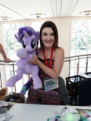 Size: 1548x2064 | Tagged: safe, artist:nekokevin, starlight glimmer, human, pony, unicorn, galacon, galacon 2018, series:nekokevin's glimmy, g4, cute, female, irl, irl human, kelly sheridan, looking at you, mare, photo, plushie, smiling, voice actor