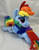 Size: 900x1143 | Tagged: safe, artist:ketika, rainbow dash, pony, g4, bedroom eyes, clothes, irl, photo, plushie, prone, scarf, solo