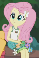 Size: 323x484 | Tagged: safe, screencap, fluttershy, equestria girls, g4, my little pony equestria girls: legend of everfree, cropped, flower, raised eyebrow