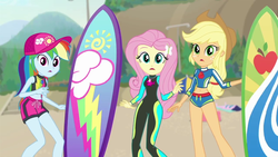 Size: 1280x720 | Tagged: safe, screencap, applejack, fluttershy, rainbow dash, blue crushed, equestria girls, g4, my little pony equestria girls: better together, belly button, clothes, female, geode of fauna, geode of super speed, geode of super strength, legs, magical geodes, shorts, sleeveless, surfboard, swimsuit, wetsuit