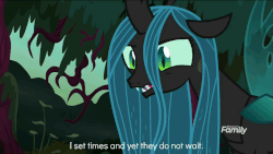 Size: 960x540 | Tagged: safe, edit, edited screencap, screencap, queen chrysalis, changeling, changeling queen, g4, the mean 6, angry, animated, crown, discovery family logo, ear, everfree forest, eye twitch, female, forest, horn, image macro, solo, text, wings