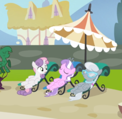Size: 626x614 | Tagged: safe, screencap, diamond tiara, silver spoon, sweetie belle, earth pony, pony, unicorn, g4, twilight time, cropped, female, filly, glasses, open mouth, pool party, reclining, smiling, umbrella