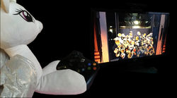 Size: 1817x1012 | Tagged: safe, princess celestia, pony, g4, build-a-bear, controller, female, food, irl, kinect party, photo, plushie, popcorn, television, xbox 360, xbox 360 camera, xbox 360 controller