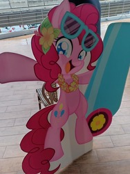 Size: 720x960 | Tagged: safe, photographer:hailblitz, pinkie pie, earth pony, pony, g4, bipedal, cardboard cutout, flower, flower in hair, garland, hibiscus, party cannon, smiling, thailand, thailand ponycon 2019, thaiponycon