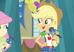 Size: 800x567 | Tagged: safe, screencap, applejack, fluttershy, best in show: the pre-show, equestria girls, equestria girls series, g4, spoiler:eqg series (season 2), animated, cropped, female, geode of fauna, geode of super strength, grin, magical geodes, microphone, smiling