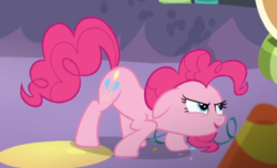 Size: 715x436 | Tagged: safe, screencap, pinkie pie, earth pony, pony, g4, party pooped, cropped, crouching, female, floppy ears, looking up, mare, narrowed eyes, open mouth, smiling, solo