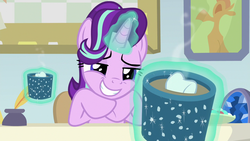 Size: 1280x720 | Tagged: safe, screencap, starlight glimmer, pony, unicorn, g4, marks for effort, chocolate, desk, empathy cocoa, female, food, geode, glowing horn, guidance counselor, hoof under chin, horn, hot chocolate, levitation, lidded eyes, magic, mare, marshmallow, offering, smiling, solo, starlight's office, teeth, telekinesis