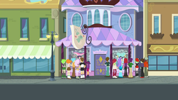 Size: 1920x1080 | Tagged: safe, screencap, aqua blossom, bright idea, cherry crash, fleur-de-lis, ginger owlseye, indigo wreath, nolan north, normal norman, rose heart, scott green, scribble dee, sophisticata, teddy t. touchdown, watermelody, display of affection, equestria girls, g4, my little pony equestria girls: better together, background human, boutique, female, lamppost, male, street