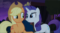 Size: 1669x941 | Tagged: safe, screencap, applejack, rarity, earth pony, pony, unicorn, g4, made in manehattan, applejack's hat, cowboy hat, cropped, duo, excited, female, hat, looking at each other, mare, raised hoof, smiling