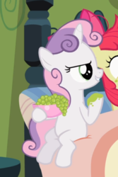 Size: 497x745 | Tagged: safe, screencap, apple bloom, sweetie belle, earth pony, pony, unicorn, family appreciation day, g4, bed, bowl, cropped, evil smile, female, filly, food, grapes, grin, offscreen character, sitting, smiling, solo focus