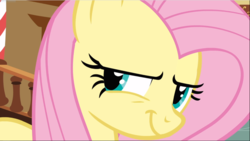 Size: 1668x941 | Tagged: safe, screencap, fluttershy, pegasus, pony, g4, putting your hoof down, close-up, evil grin, female, grin, mare, narrowed eyes, smiling, smirk, solo