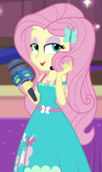 Size: 534x898 | Tagged: safe, screencap, fluttershy, best in show: the victory lap, equestria girls, g4, my little pony equestria girls: better together, beautiful, best in show logo, clothes, cropped, cute, dress, eyeshadow, female, fluttershy boho dress, geode of fauna, hair, lidded eyes, magical geodes, makeup, microphone, playing with hair, shyabetes, solo, teenager