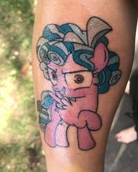 Size: 1080x1350 | Tagged: safe, cozy glow, human, pegasus, pony, g4, evil, evil grin, female, filly, grin, irl, irl human, photo, pure concentrated unfiltered evil of the utmost potency, raised hoof, smiling, tattoo