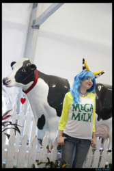 Size: 3456x5184 | Tagged: safe, artist:krazykari, oc, oc:milky way, cow, human, clothes, cosplay, costume, irl, irl human, mega milk, meme, photo, shirt, solo, statue, udder
