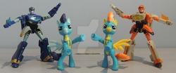 Size: 1280x530 | Tagged: safe, artist:lonetrekker, soarin', spitfire, pony, g4, action figure, crossover, guardians of harmony, irl, jetfire, jetstorm, obtrusive watermark, photo, toy, transformers, transformers animated, watermark, wonderbolts
