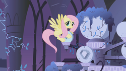 Size: 1280x720 | Tagged: safe, screencap, fluttershy, pegasus, pony, friendship is magic, g4, castle of the royal pony sisters, female, flying, mare, ruins, solo