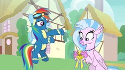 Size: 1920x1080 | Tagged: safe, screencap, rainbow dash, silverstream, classical hippogriff, hippogriff, pegasus, pony, g4, uprooted, clothes, discovery family logo, dream, duo, female, goggles, mare, medal, uniform, wonderbolts uniform