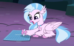 Size: 1010x628 | Tagged: safe, screencap, silverstream, classical hippogriff, hippogriff, pony, g4, uprooted, cave, chalk, cropped, cute, diastreamies, drawing, female, graph paper, happy, open mouth, prone, smiling, solo, the place where we belong