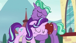 Size: 1024x576 | Tagged: safe, screencap, firelight, starlight glimmer, pony, unicorn, g4, the parent map, cute, eyes closed, father and daughter, female, hug, male, mare, reformed starlight, stallion